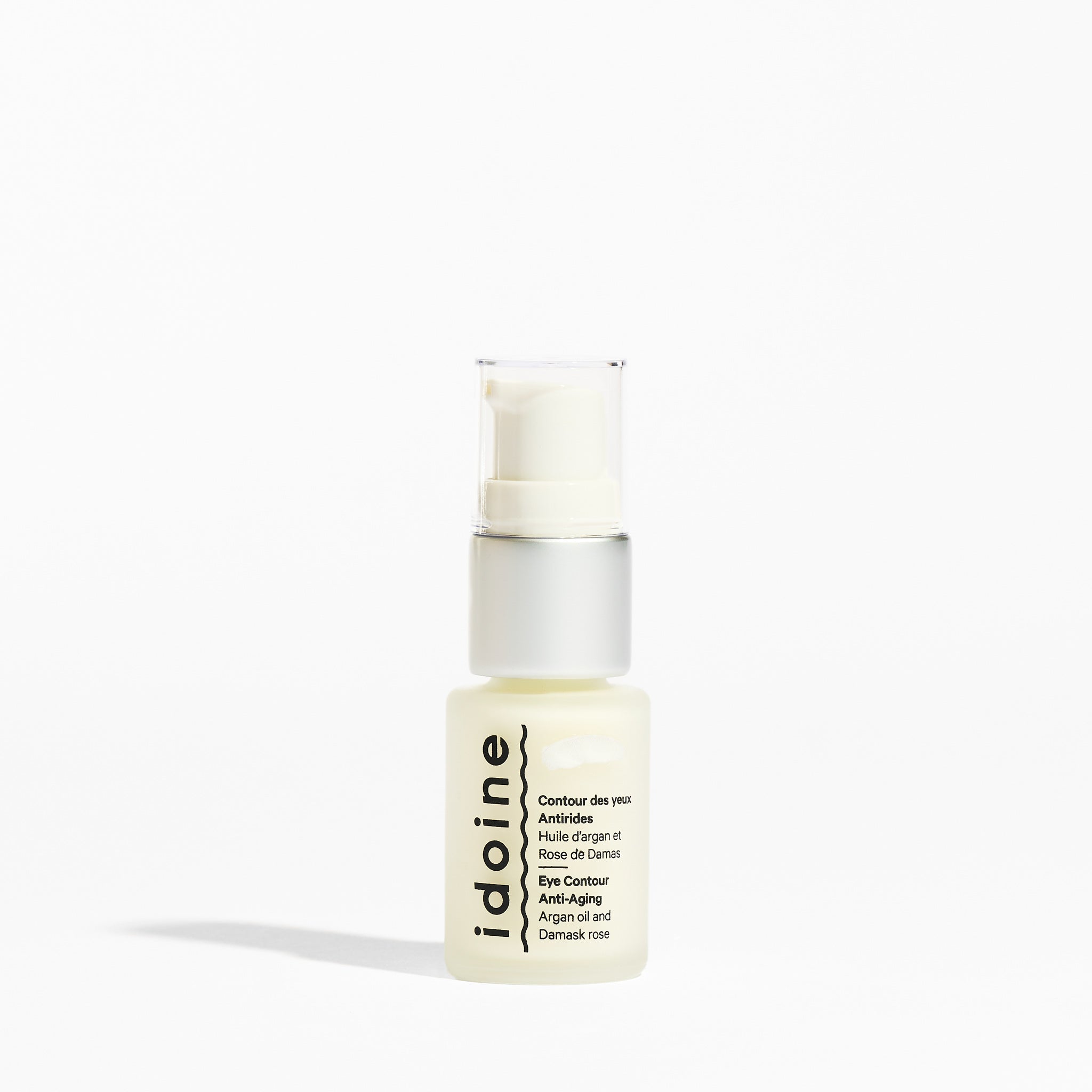 Flacon pompe Idoine Bio Contour des Yeux Antirides à l'huile d'argan et à la rose de Damas, fond blanc.