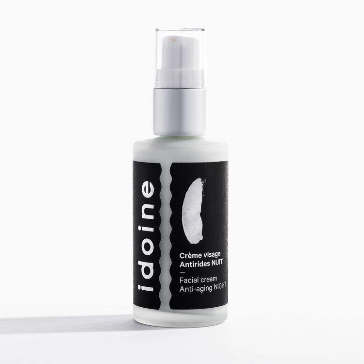 Idoine anti-aging night facial cream bottle on white background, pump dispenser highlighting minimalist packaging and skincare use dail
